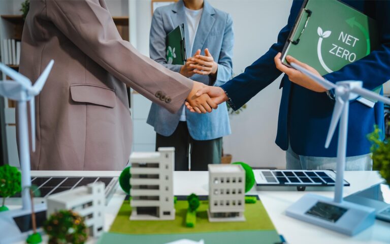 Business-people-shaking-hands-on-energy-project