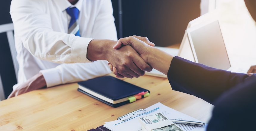 Business woman signing a loan for investment, negotiation