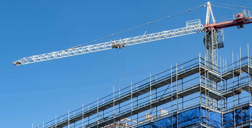 Construction-crane-on-a-highrise-building-construction-site_ (1)